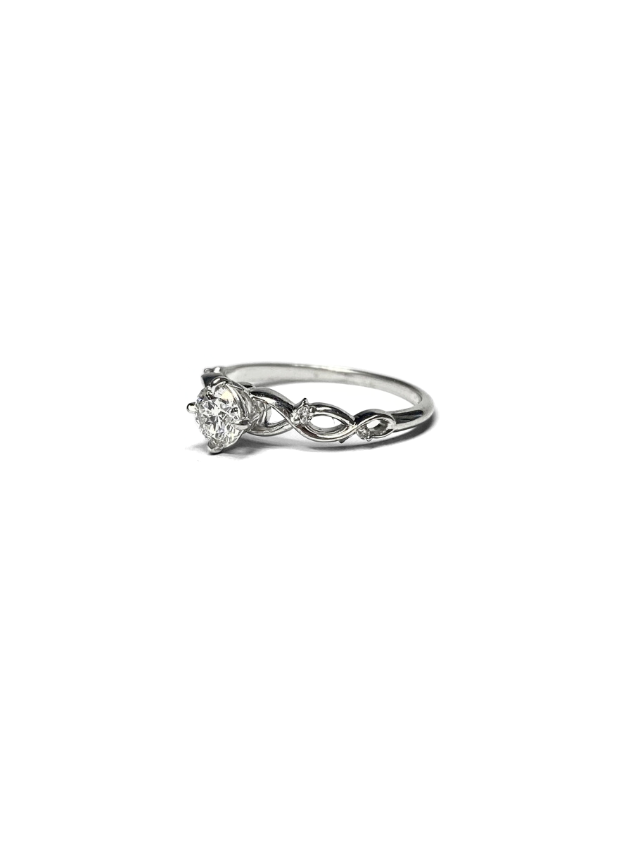 Twisting Shoulders Diamond and White Gold Ring