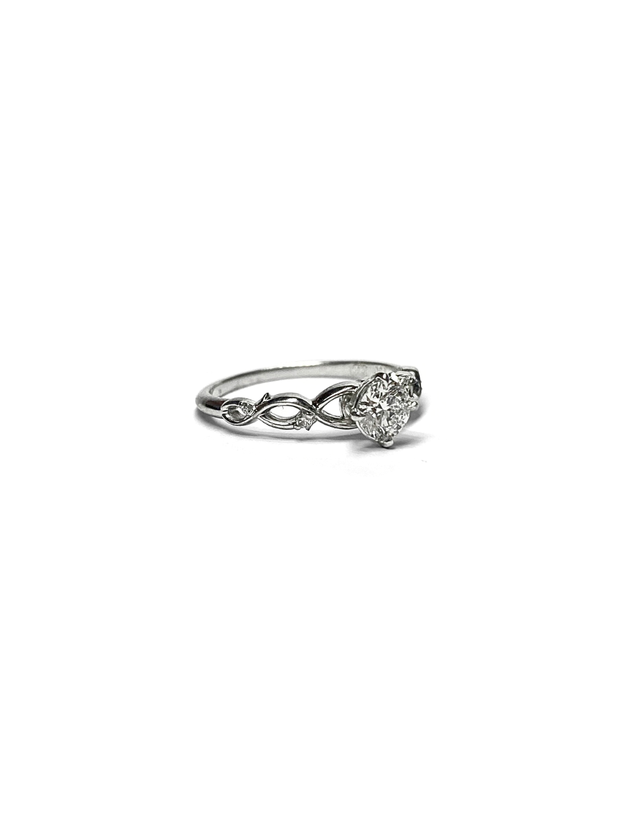 Twisting Shoulders Diamond and White Gold Ring